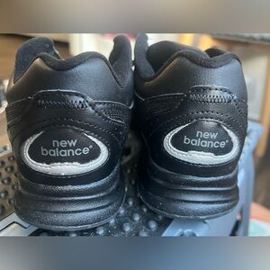 New Balance women’s Black and Gray Sneakers